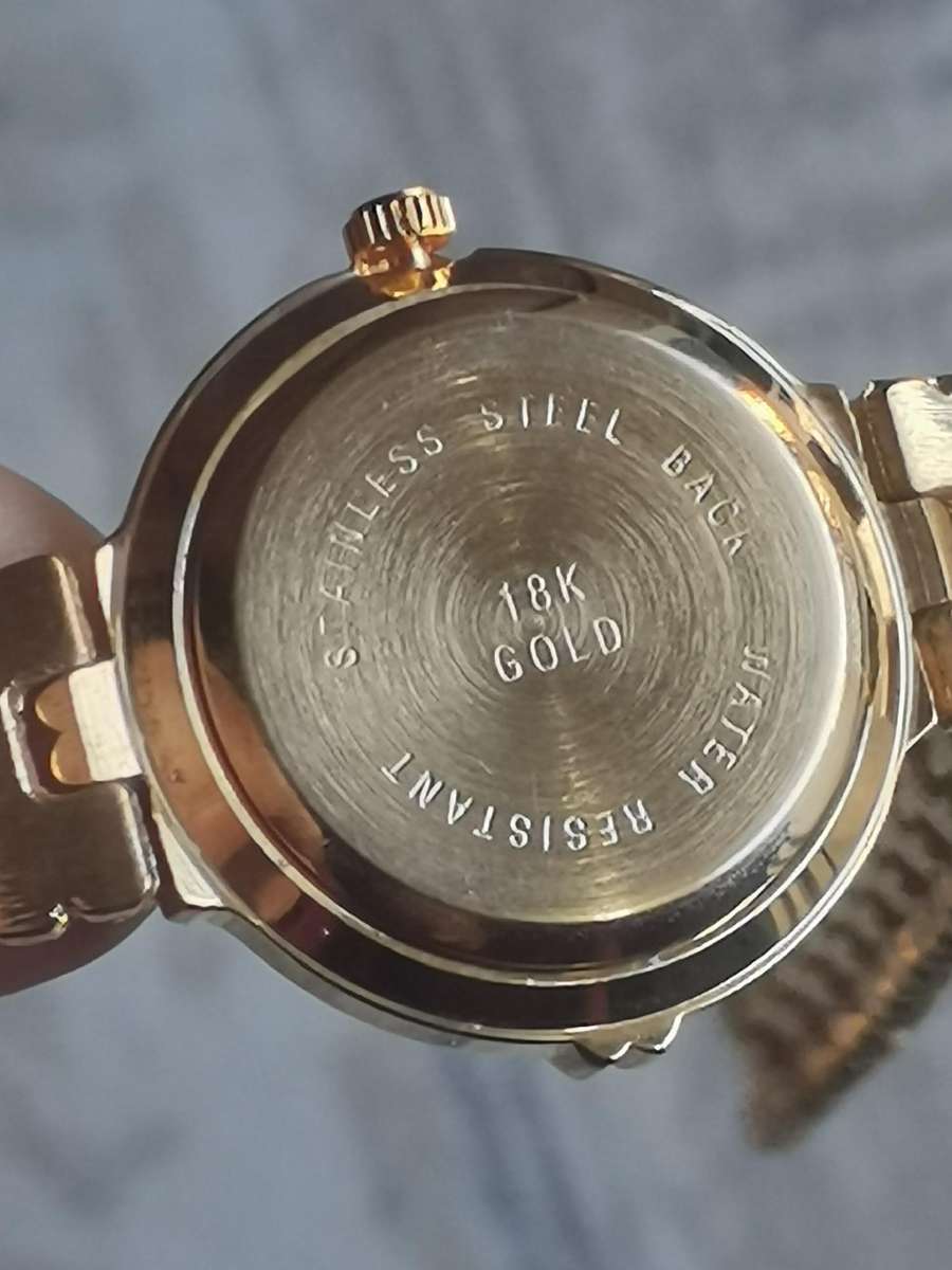 LADIES STL 18K GOLD PLATED WATCH IN EXCELLENT WORKING CONDITION