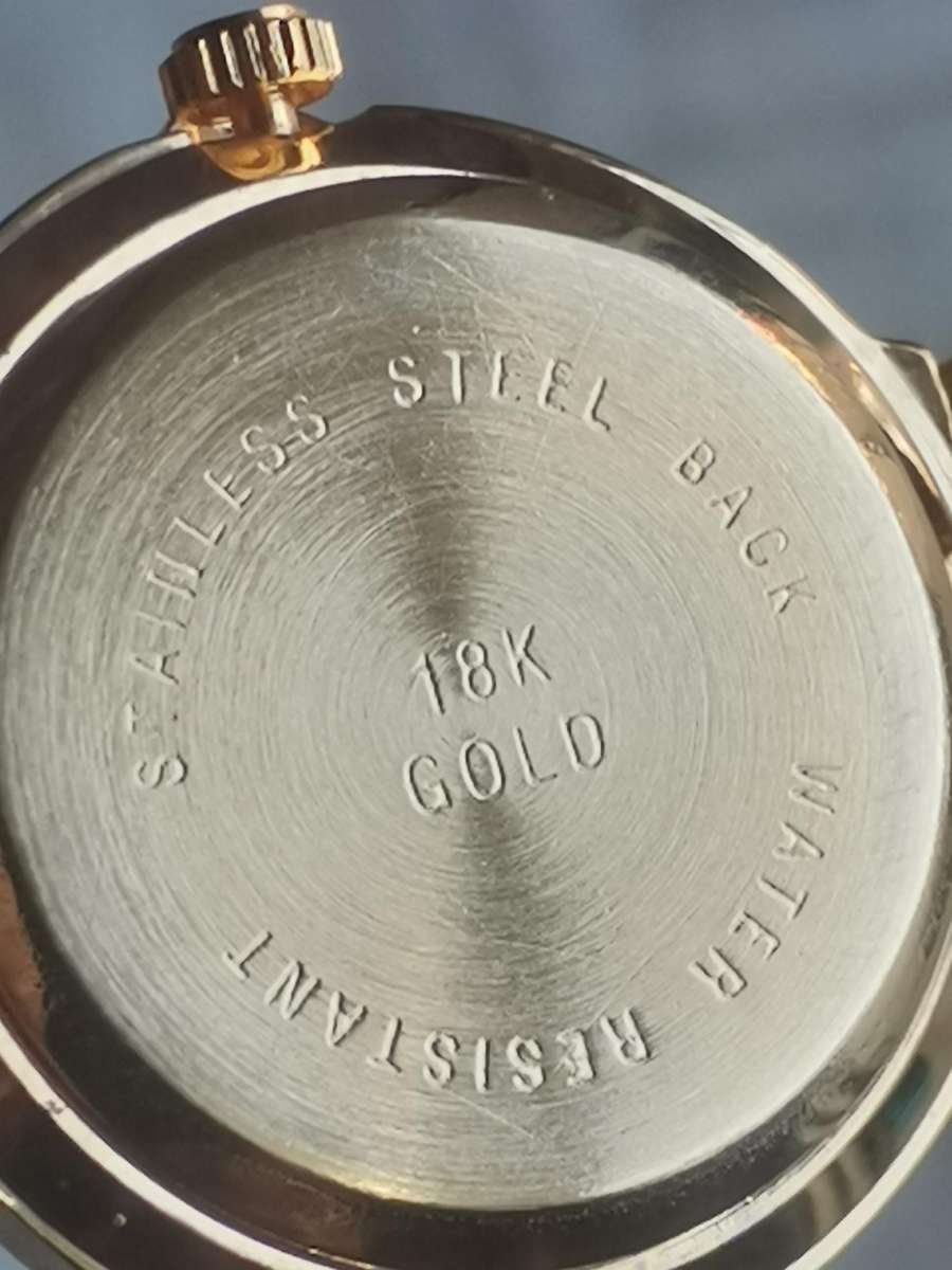 LADIES STL 18K GOLD PLATED WATCH IN EXCELLENT WORKING CONDITION