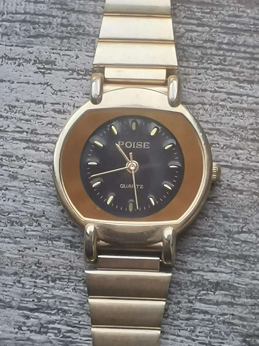 ELEGANT LADIES POISE GOLD WATCH IN EXCELLENT WORKING CONDITION