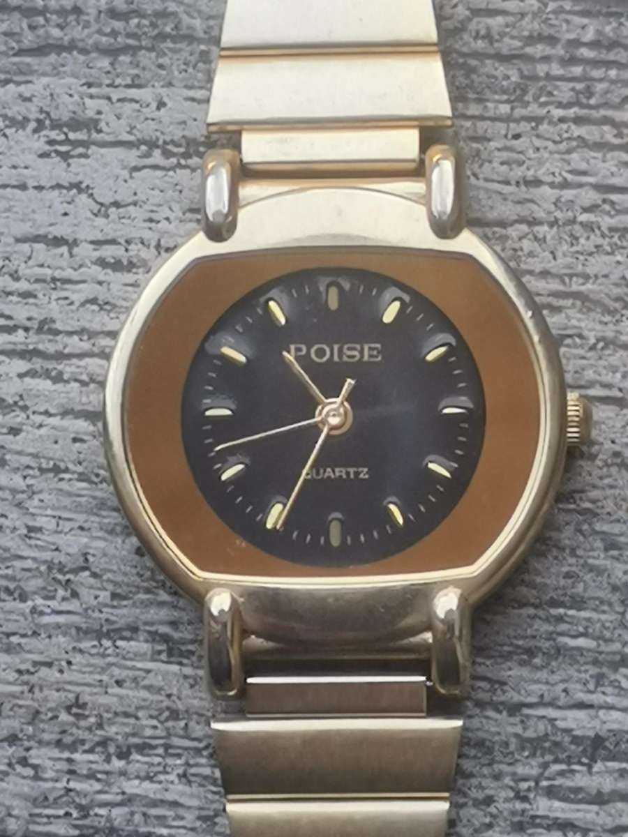 ELEGANT LADIES POISE GOLD WATCH IN EXCELLENT WORKING CONDITION