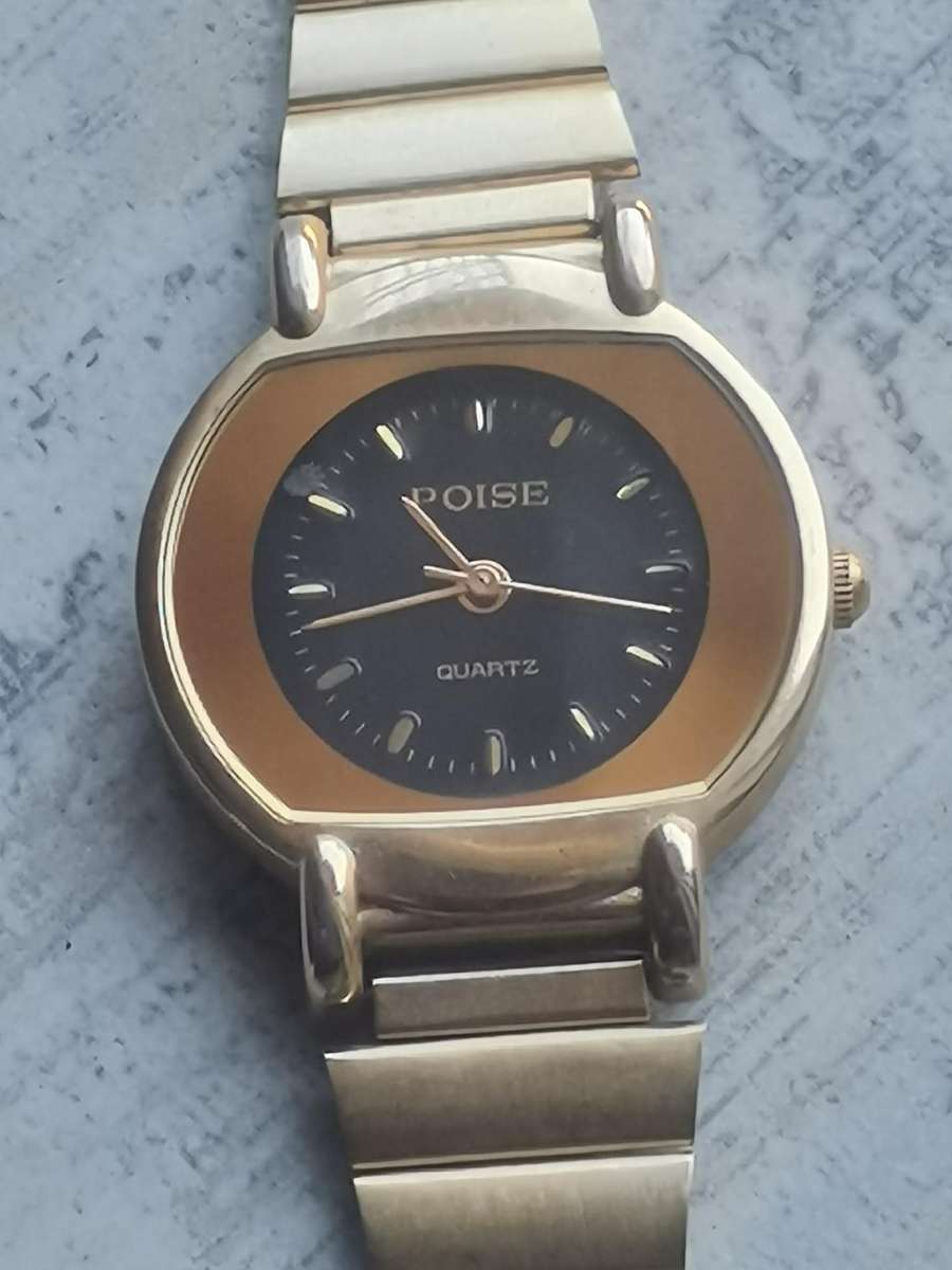 ELEGANT LADIES POISE GOLD WATCH IN EXCELLENT WORKING CONDITION