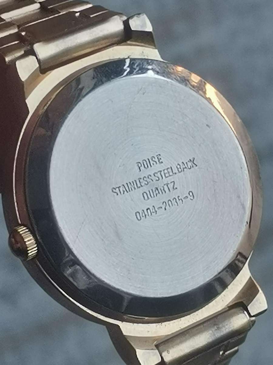 ELEGANT LADIES POISE GOLD WATCH IN EXCELLENT WORKING CONDITION