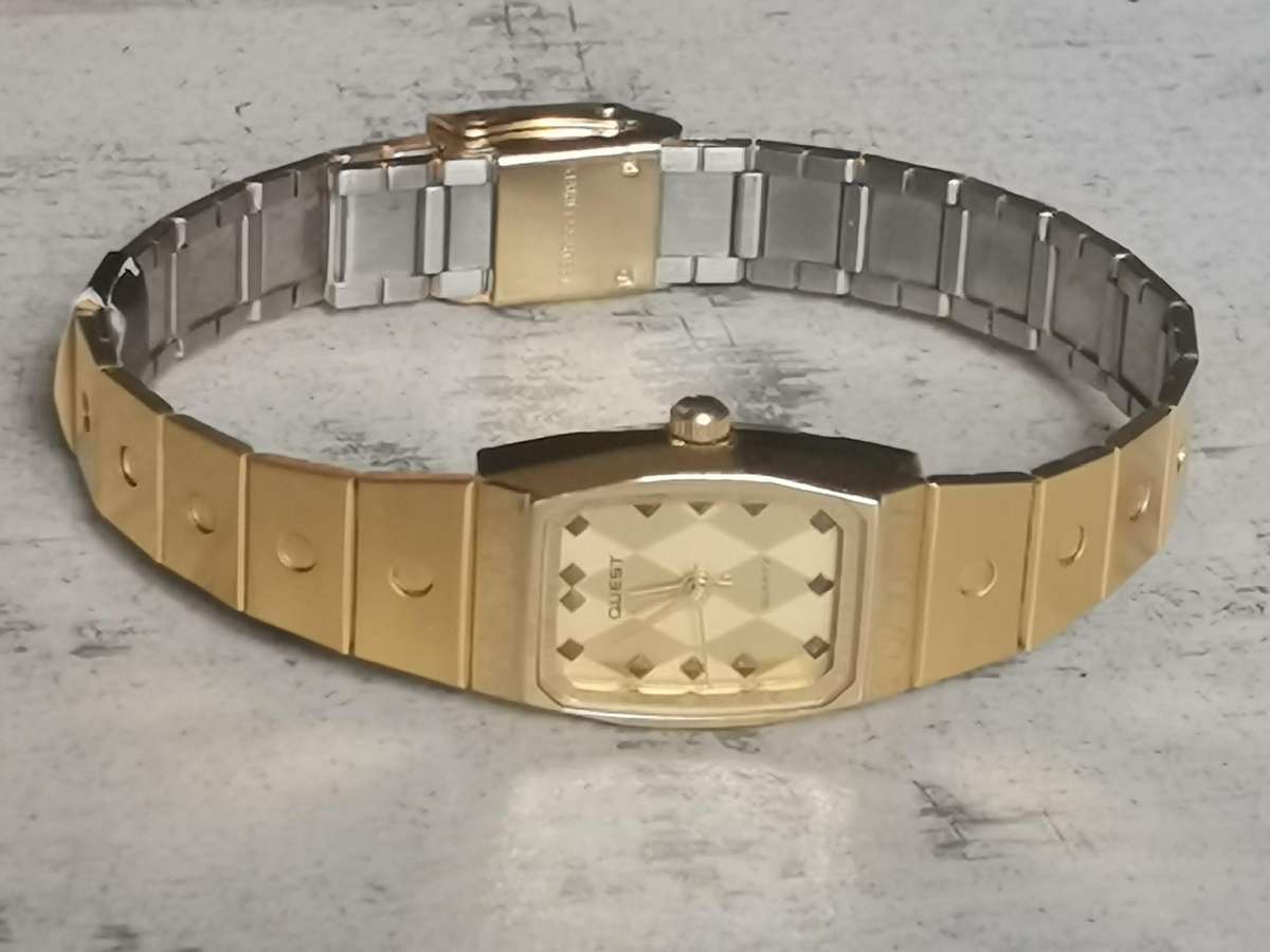 LADIES GOLD QUEST WATCH IN EXCELLENT WORKING CONDITION