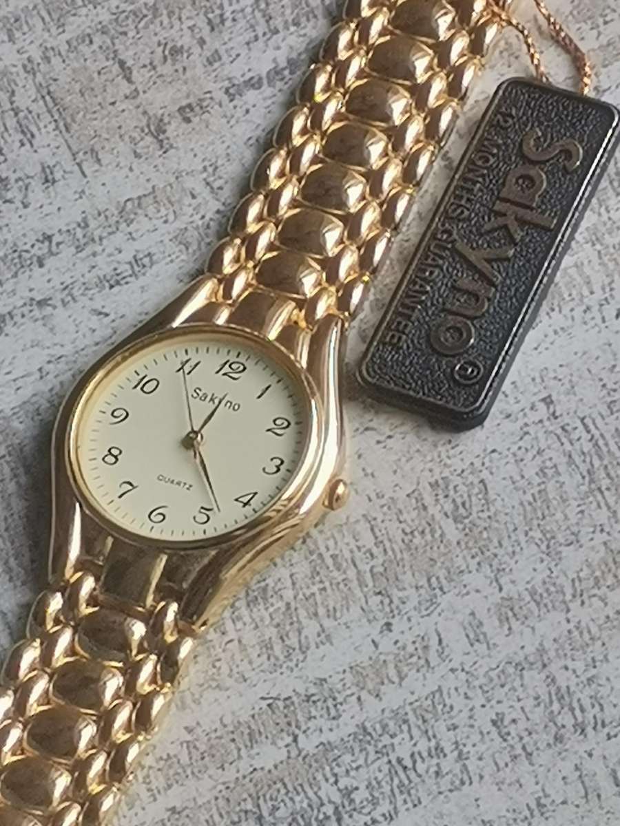 MENS VINTAGE GOLD PLATED SAKYNO WATCH IN EXCELLENT WORKING CONDITION