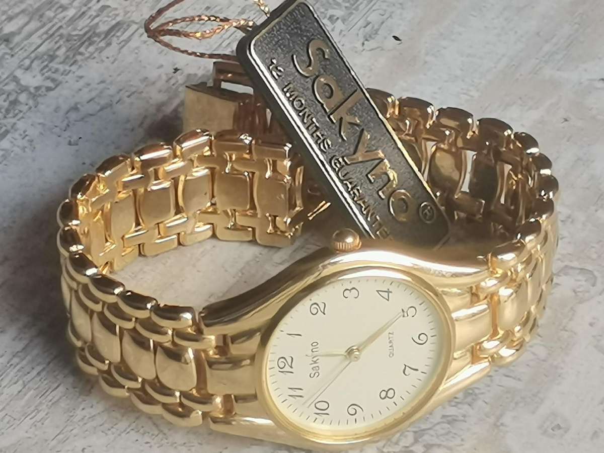 MENS VINTAGE GOLD PLATED SAKYNO WATCH IN EXCELLENT WORKING CONDITION