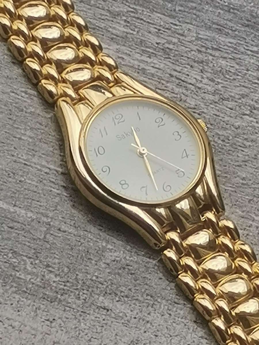 MENS VINTAGE GOLD PLATED SAKYNO WATCH IN EXCELLENT WORKING CONDITION