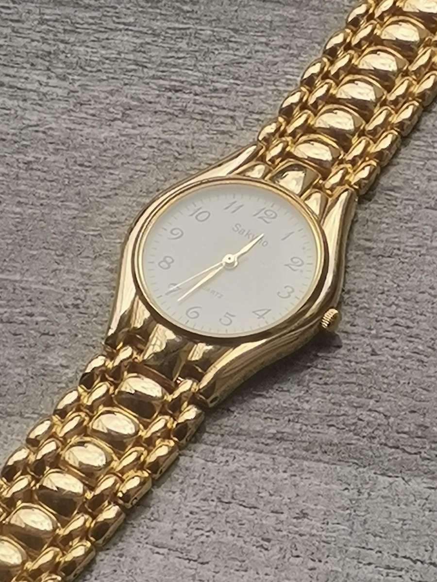 MENS VINTAGE GOLD PLATED SAKYNO WATCH IN EXCELLENT WORKING CONDITION