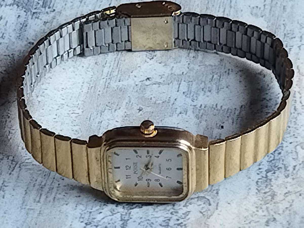 LADIES GOLD PLATED POISE WATCH IN EXCELLENT WORKING CONDITION