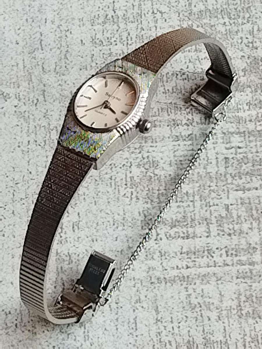 LADIES SAKYNO STAINLESS STEEL WATCH IN EXCELLENT WORKING CONDITION