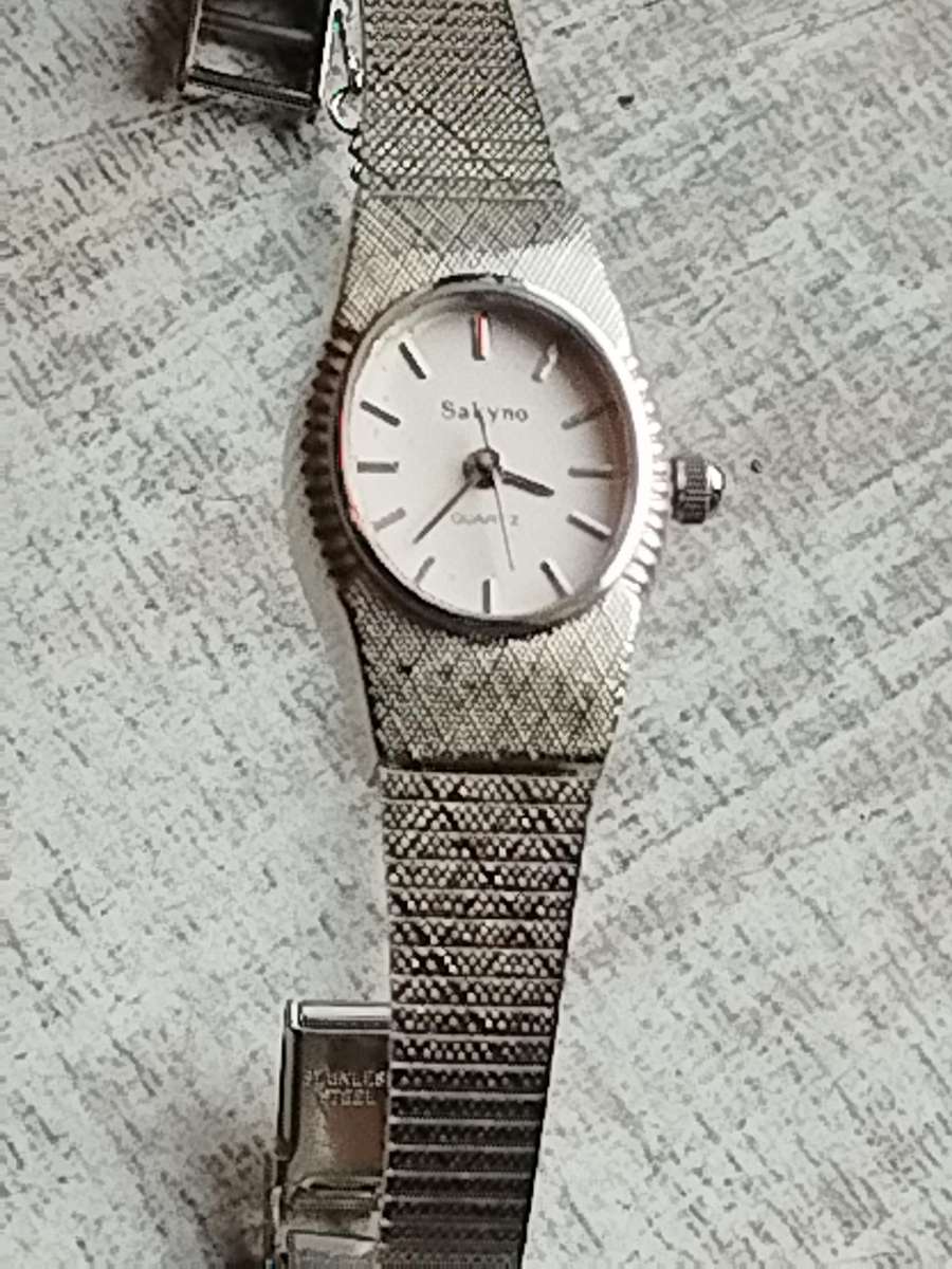 LADIES SAKYNO STAINLESS STEEL WATCH IN EXCELLENT WORKING CONDITION