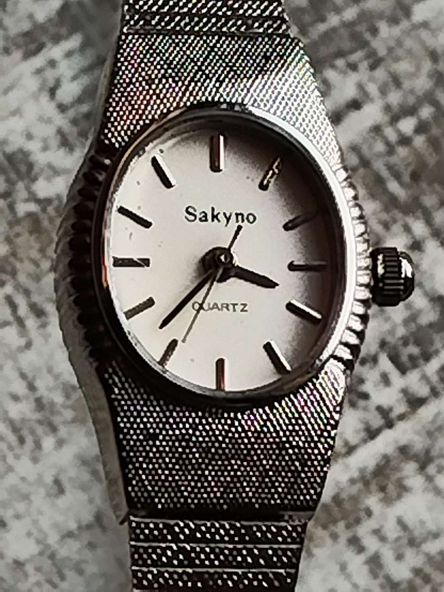 LADIES SAKYNO STAINLESS STEEL WATCH IN EXCELLENT WORKING CONDITION