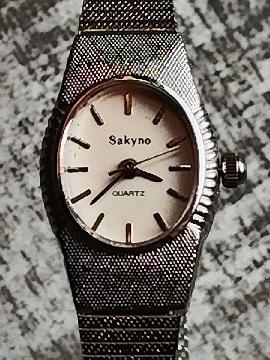 LADIES SAKYNO STAINLESS STEEL WATCH IN EXCELLENT WORKING CONDITION