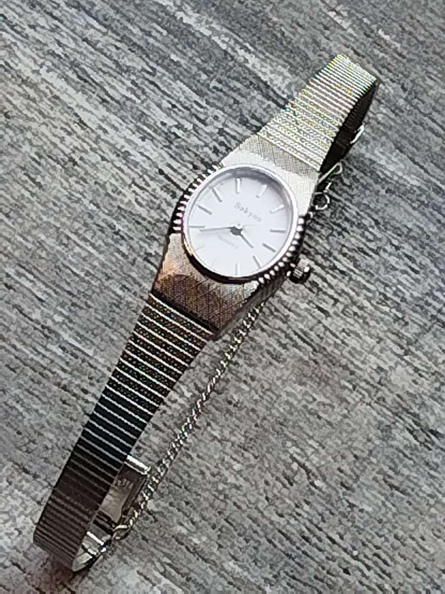 LADIES SAKYNO STAINLESS STEEL WATCH IN EXCELLENT WORKING CONDITION