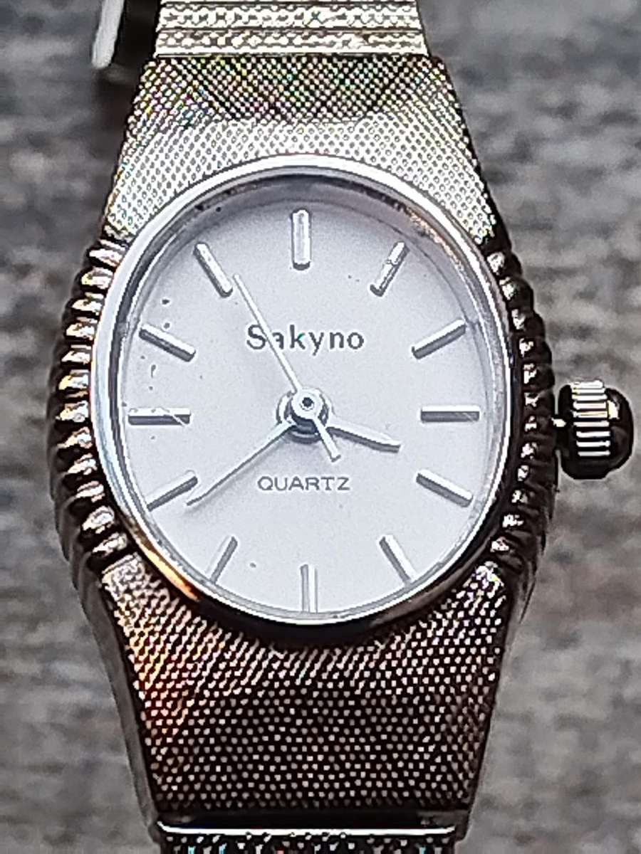 LADIES SAKYNO STAINLESS STEEL WATCH IN EXCELLENT WORKING CONDITION