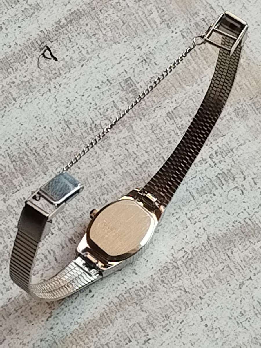 LADIES SAKYNO STAINLESS STEEL WATCH IN EXCELLENT WORKING CONDITION