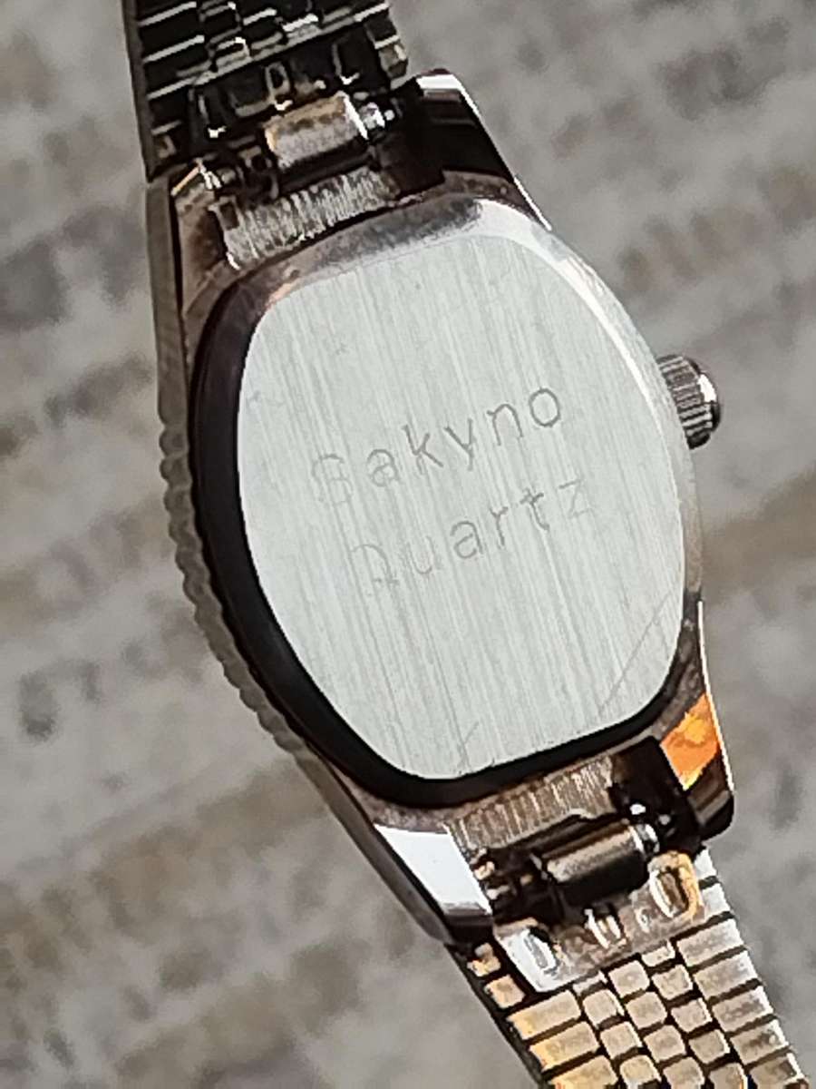 LADIES SAKYNO STAINLESS STEEL WATCH IN EXCELLENT WORKING CONDITION