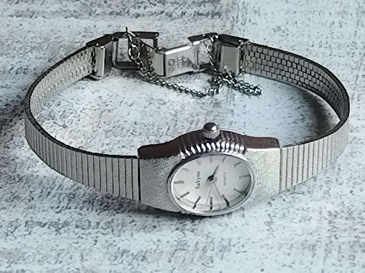LADIES SAKYNO STAINLESS STEEL WATCH IN EXCELLENT WORKING CONDITION