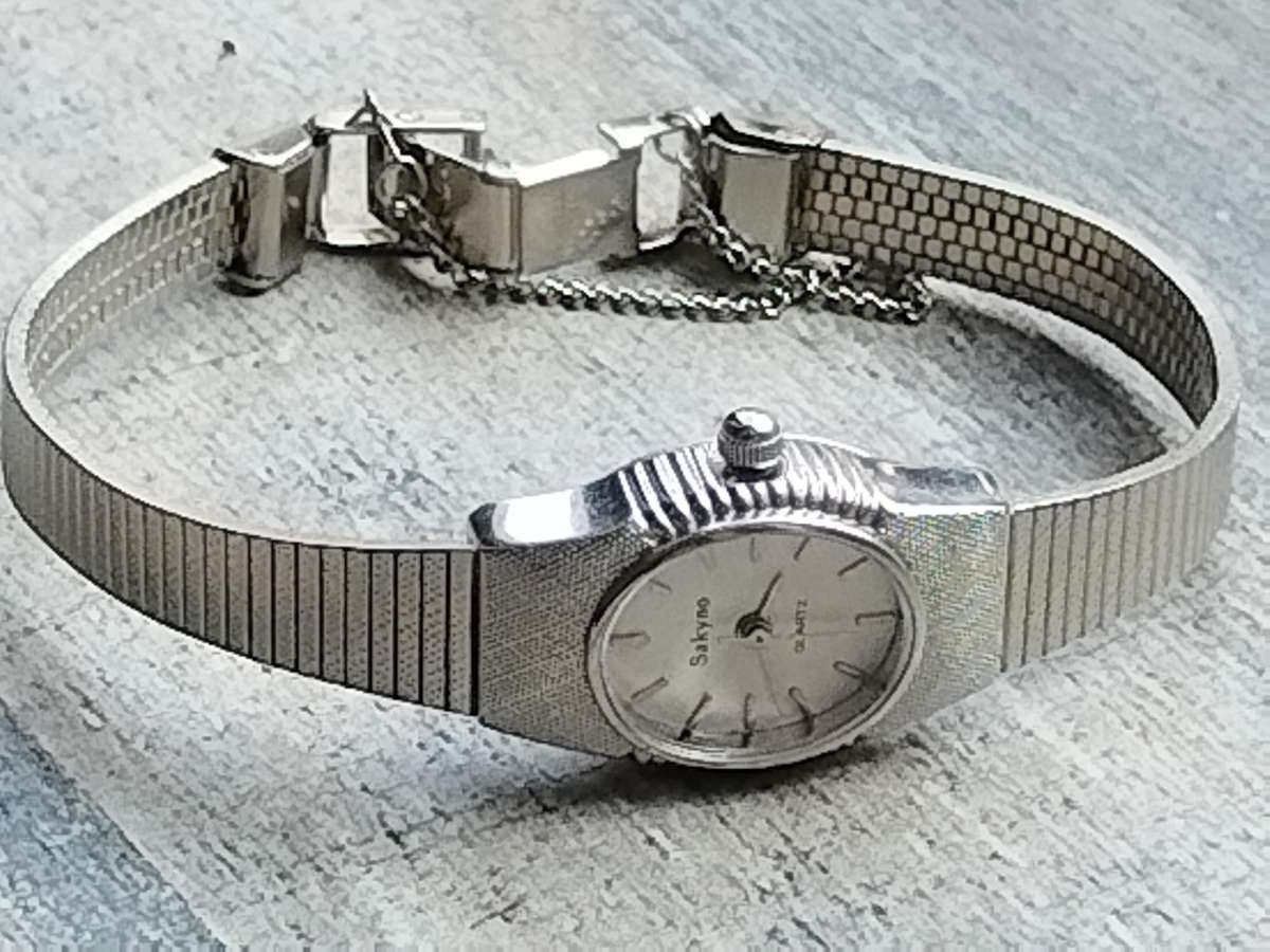 LADIES SAKYNO STAINLESS STEEL WATCH IN EXCELLENT WORKING CONDITION