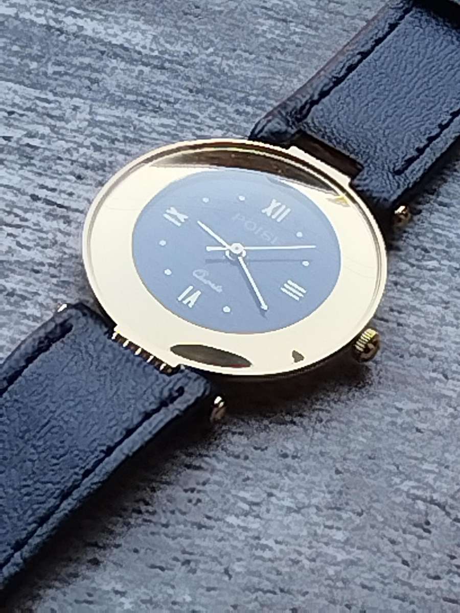 STUNNING AND ELEGANT LADIES POISE GOLD WATCH IN EXCELLENT WORKING CONDITION