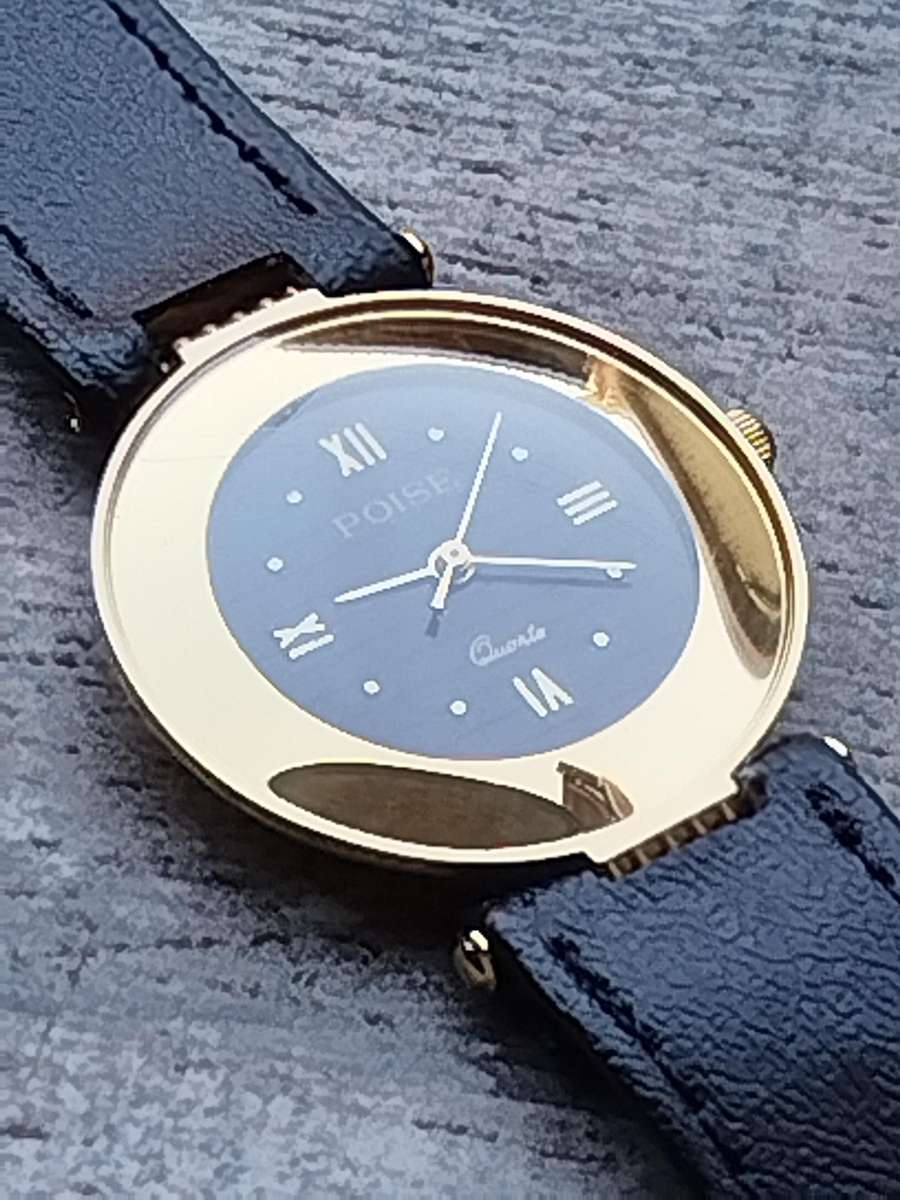 STUNNING AND ELEGANT LADIES POISE GOLD WATCH IN EXCELLENT WORKING CONDITION