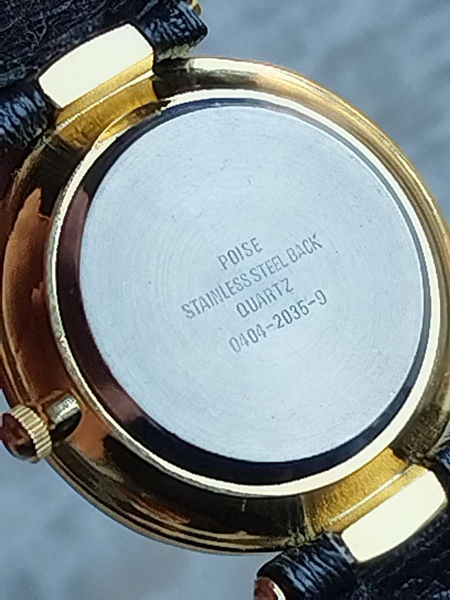 STUNNING AND ELEGANT LADIES POISE GOLD WATCH IN EXCELLENT WORKING CONDITION