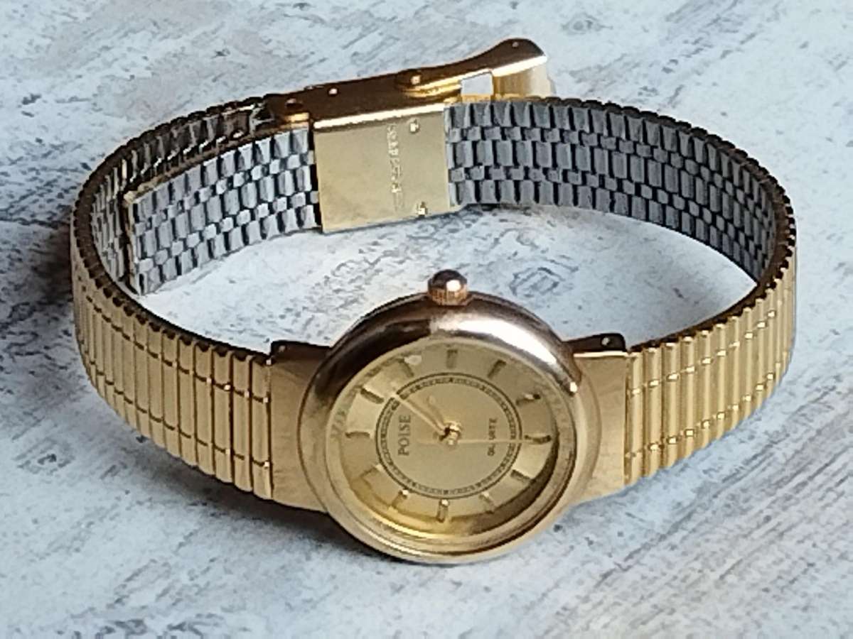LADIES ALL GOLD POISE WATCH IN EXCELLENT WORKING CONDITION