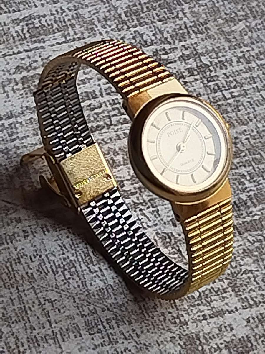 LADIES ALL GOLD POISE WATCH IN EXCELLENT WORKING CONDITION