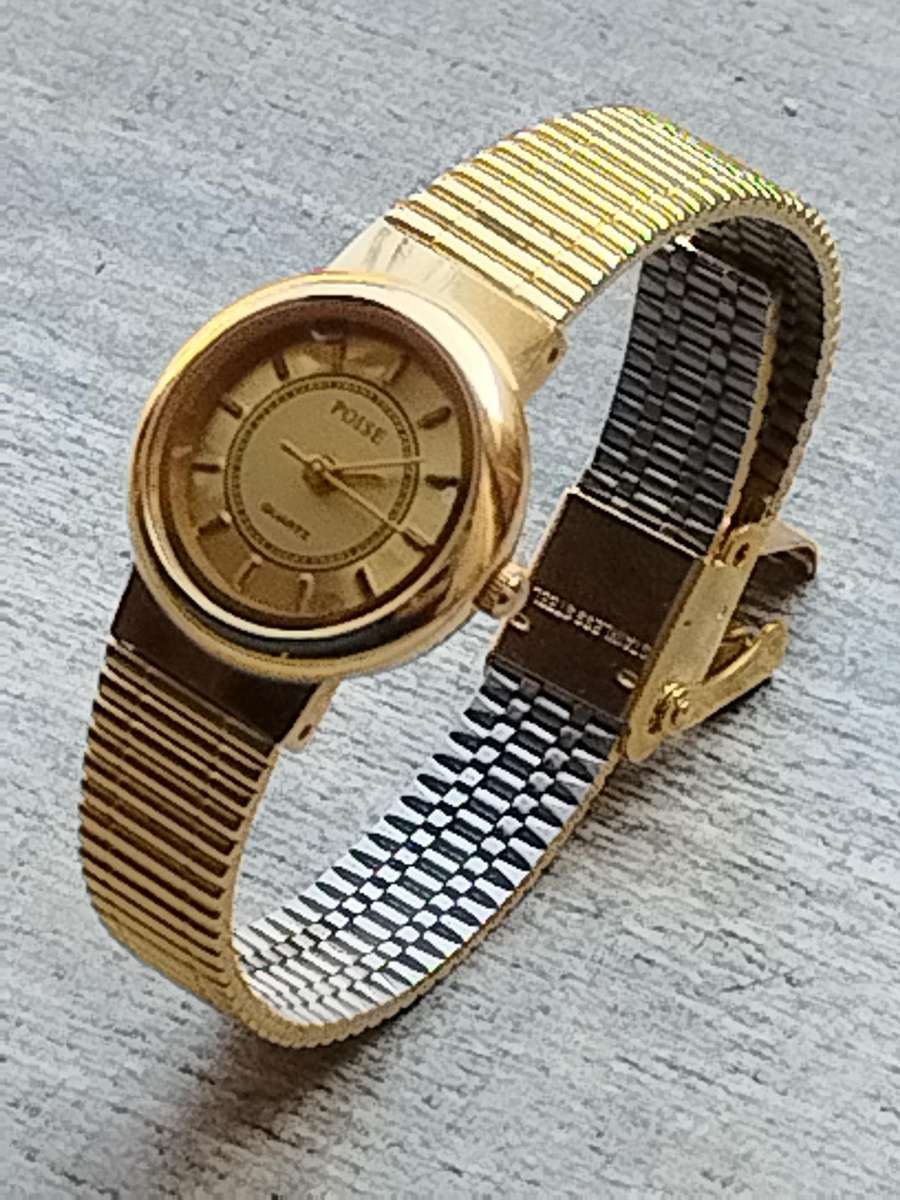 LADIES ALL GOLD POISE WATCH IN EXCELLENT WORKING CONDITION