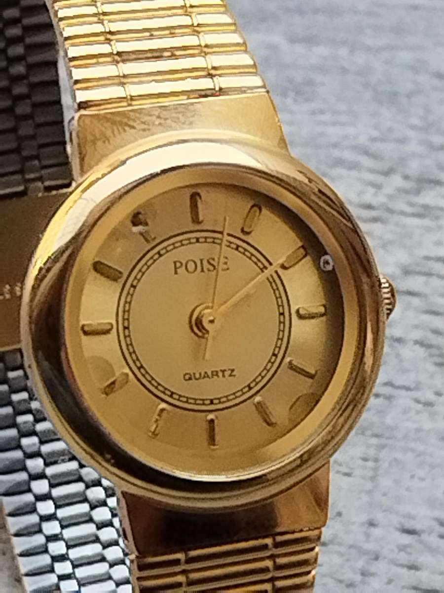 LADIES ALL GOLD POISE WATCH IN EXCELLENT WORKING CONDITION