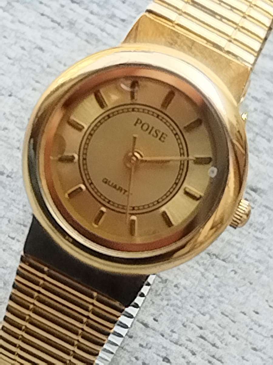 LADIES ALL GOLD POISE WATCH IN EXCELLENT WORKING CONDITION