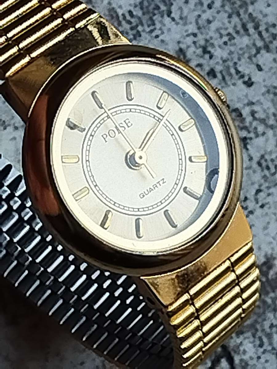 LADIES ALL GOLD POISE WATCH IN EXCELLENT WORKING CONDITION