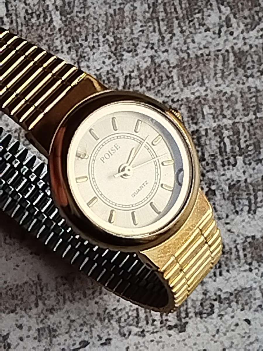 LADIES ALL GOLD POISE WATCH IN EXCELLENT WORKING CONDITION