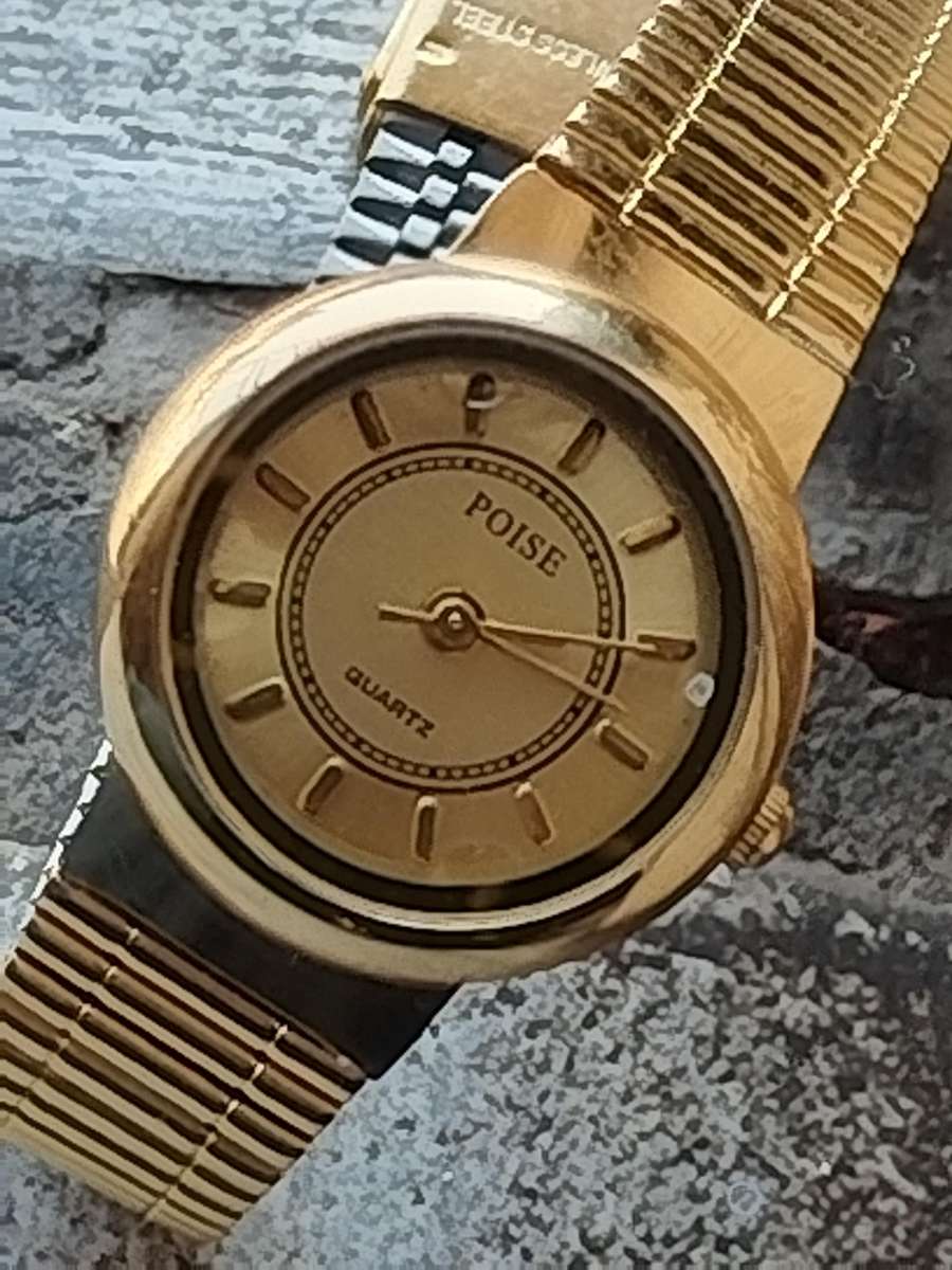 LADIES ALL GOLD POISE WATCH IN EXCELLENT WORKING CONDITION