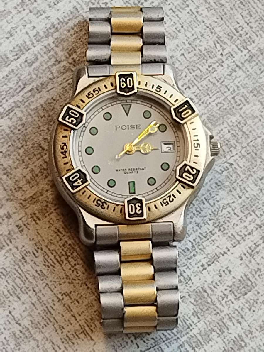 MENS VINTAGE POISE WATCH WITH ROTATING BEZEL IN EXCELLENT WORKING CONDITION