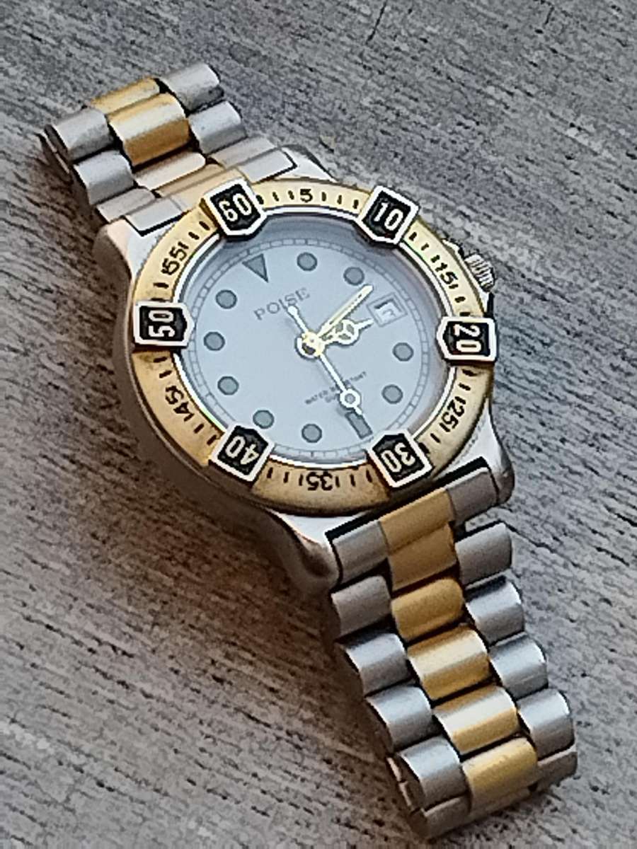 MENS VINTAGE POISE WATCH WITH ROTATING BEZEL IN EXCELLENT WORKING CONDITION