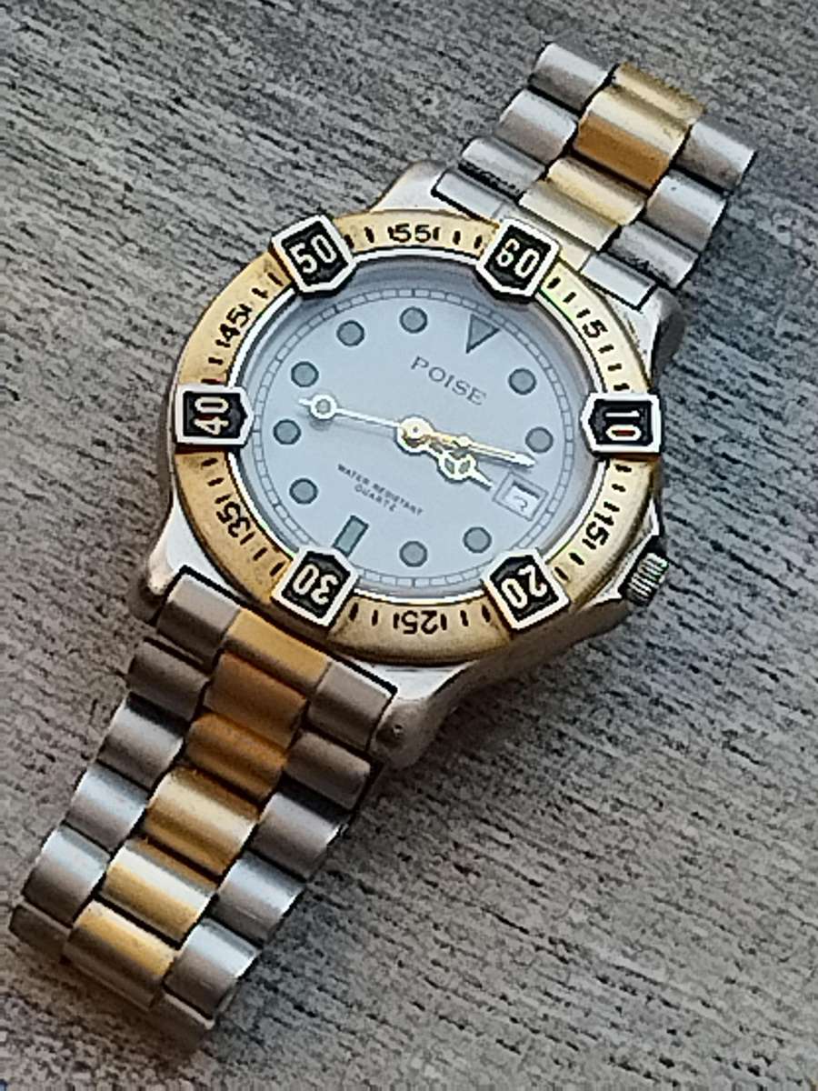 MENS VINTAGE POISE WATCH WITH ROTATING BEZEL IN EXCELLENT WORKING CONDITION