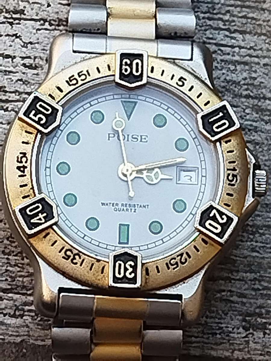 MENS VINTAGE POISE WATCH WITH ROTATING BEZEL IN EXCELLENT WORKING CONDITION