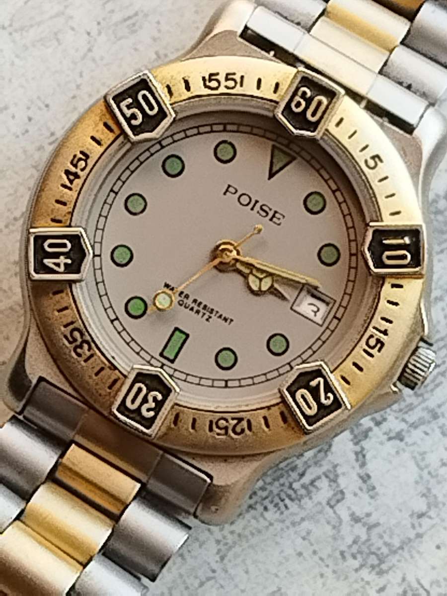 MENS VINTAGE POISE WATCH WITH ROTATING BEZEL IN EXCELLENT WORKING CONDITION