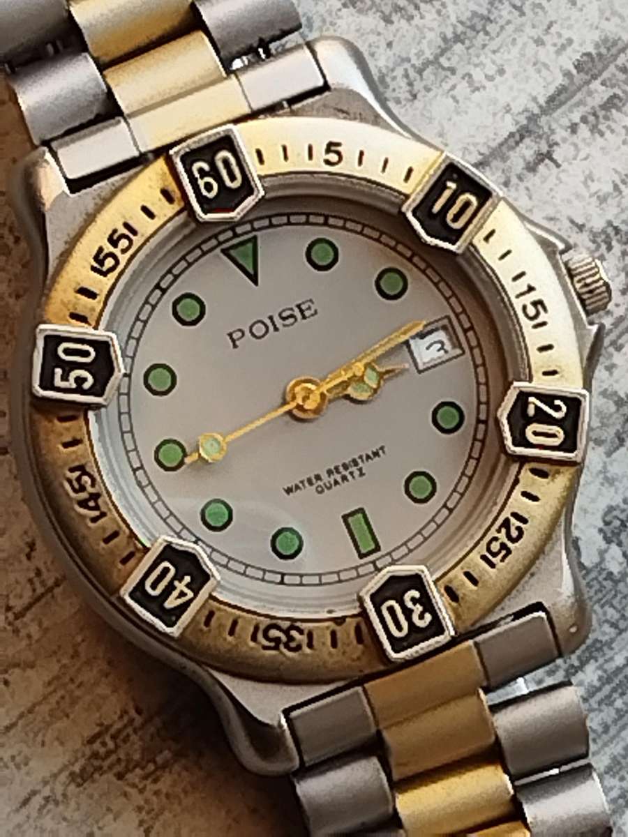 MENS VINTAGE POISE WATCH WITH ROTATING BEZEL IN EXCELLENT WORKING CONDITION