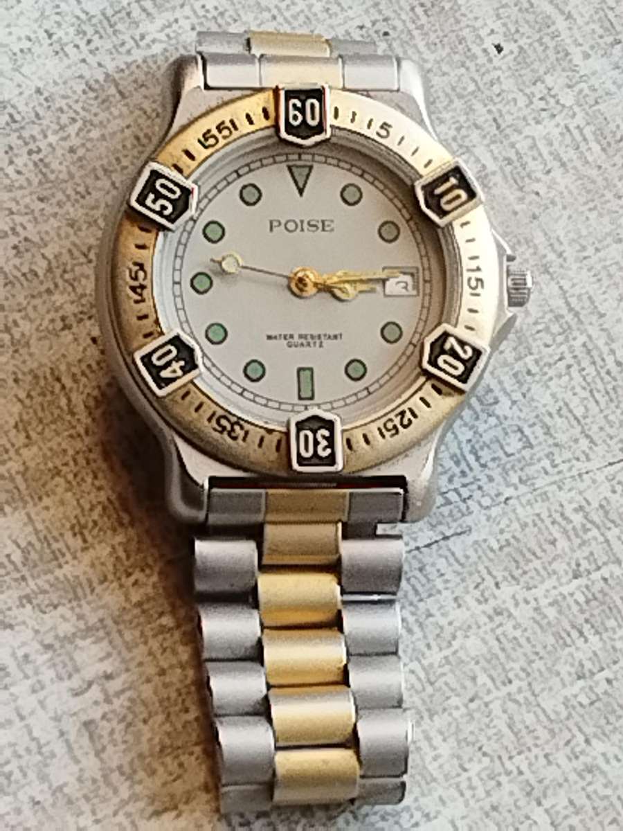 MENS VINTAGE POISE WATCH WITH ROTATING BEZEL IN EXCELLENT WORKING CONDITION