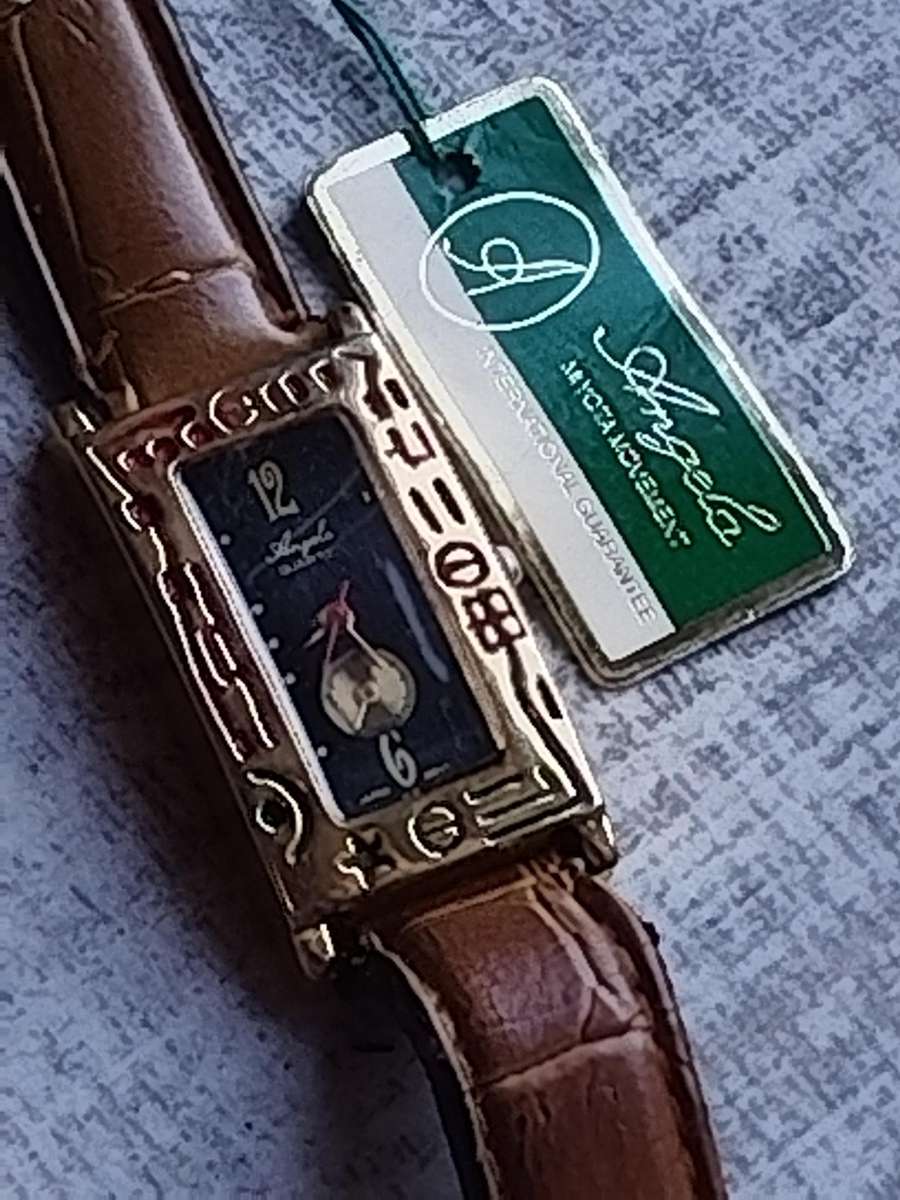 ELEGANT LADIES ANGELA GOLD WATCH IN EXCELLENT WORKING CONDITION