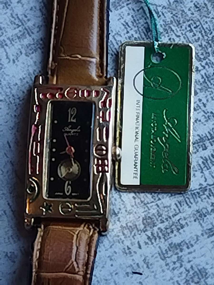 ELEGANT LADIES ANGELA GOLD WATCH IN EXCELLENT WORKING CONDITION