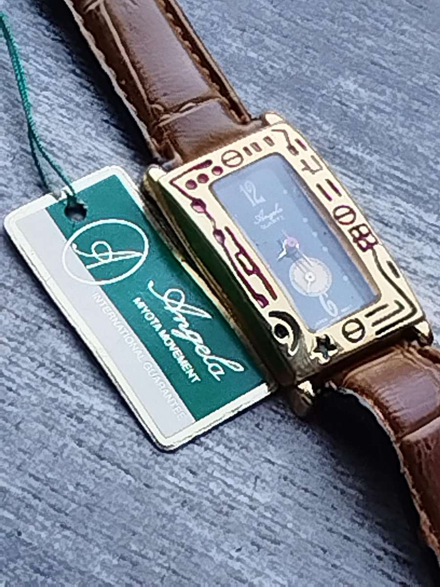 ELEGANT LADIES ANGELA GOLD WATCH IN EXCELLENT WORKING CONDITION