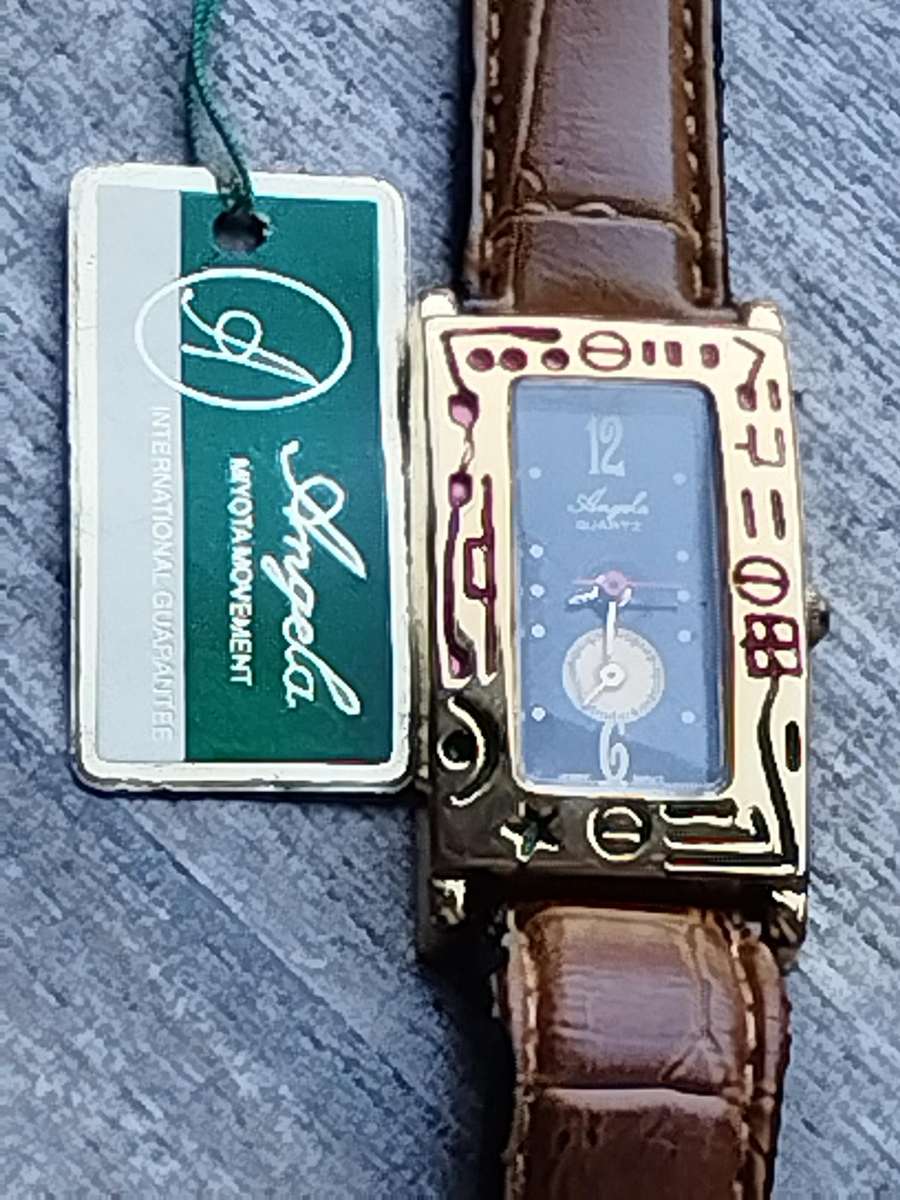 ELEGANT LADIES ANGELA GOLD WATCH IN EXCELLENT WORKING CONDITION