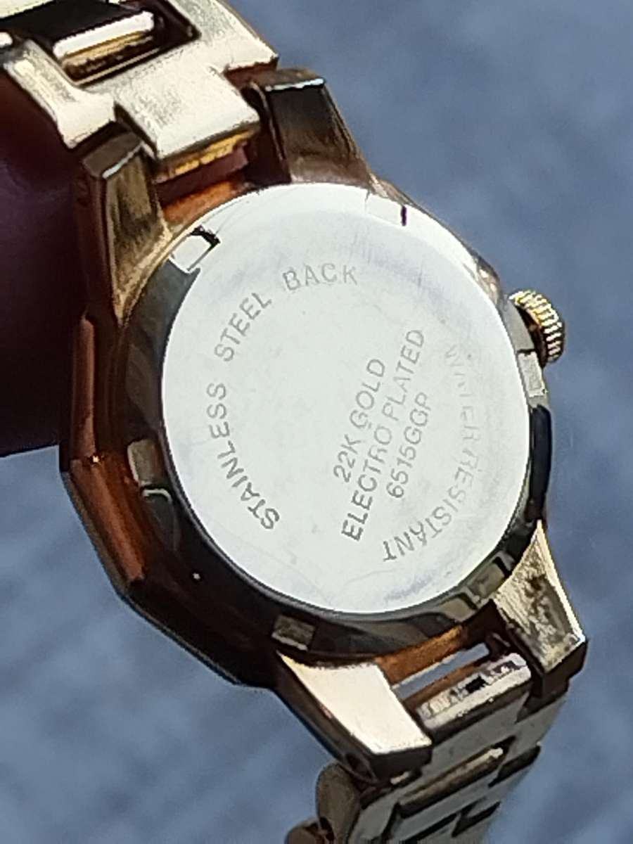 LADIES WESTAR 22K GOLD PLATED WATCH IN EXCELLENT WORKING CONDITION