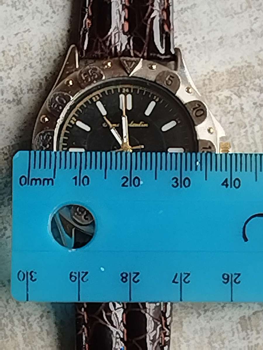 MENS RENE VALENTIN WATCH WITH ROTATING BEZEL IN EXCELLENT WORKING CONDITION