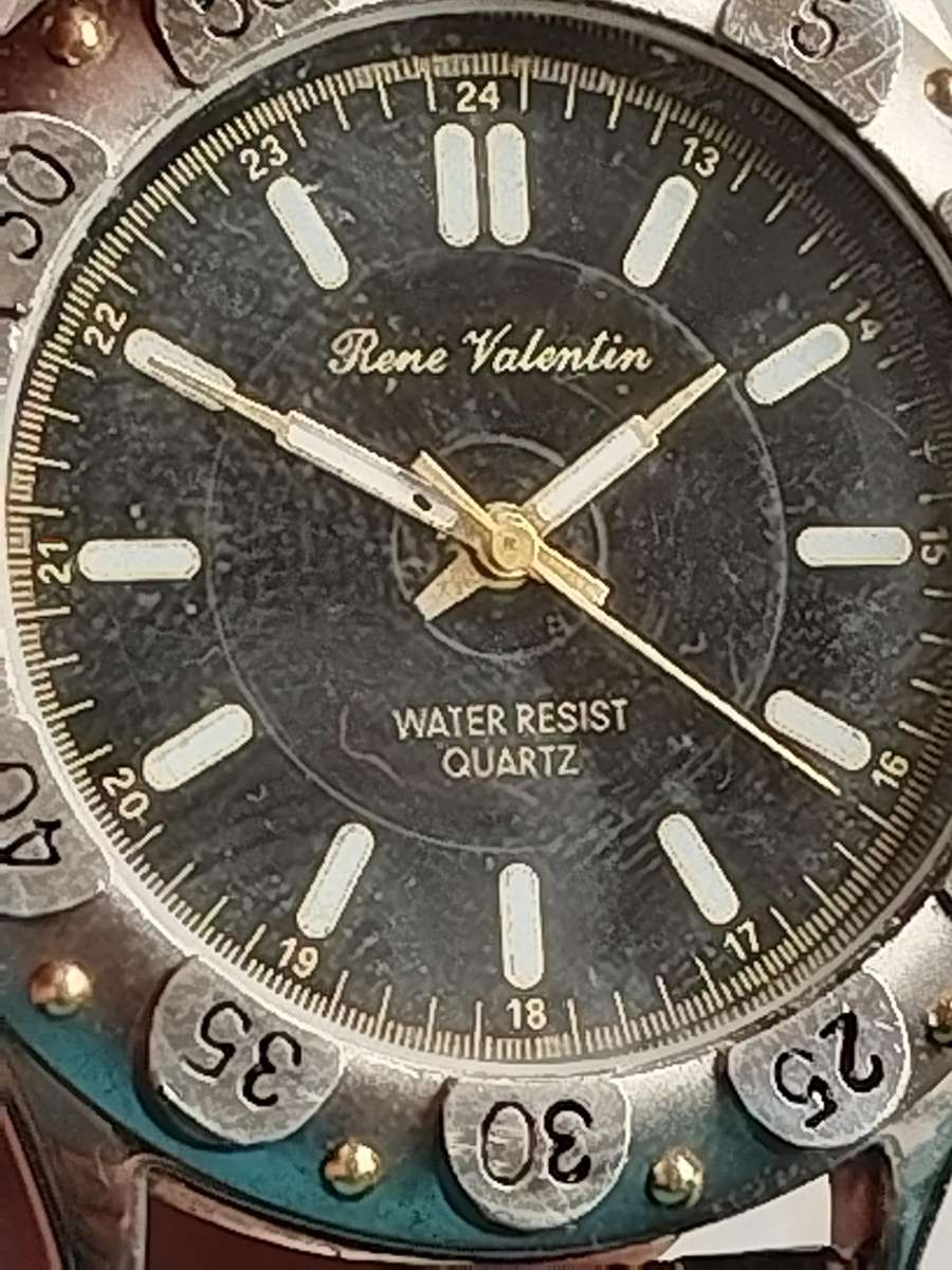 MENS RENE VALENTIN WATCH WITH ROTATING BEZEL IN EXCELLENT WORKING CONDITION