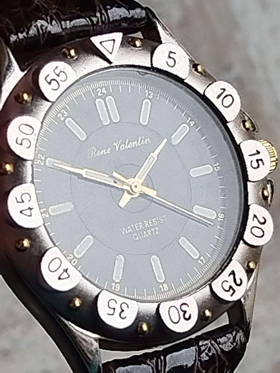 MENS RENE VALENTIN WATCH WITH ROTATING BEZEL IN EXCELLENT WORKING CONDITION