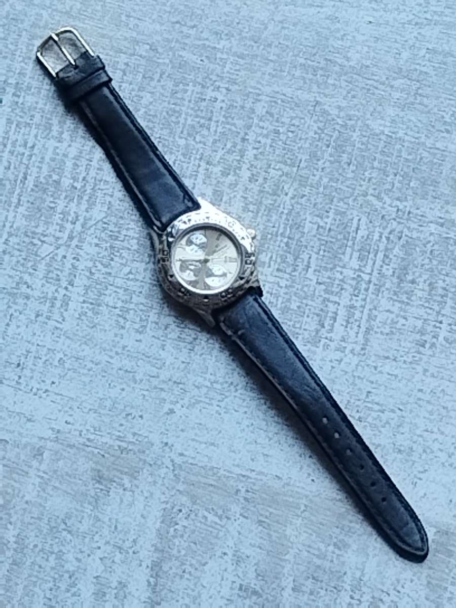 ELEGANT LADIES FLORENCE WATCH WITH ROTATING BEZEL IN EXCELLENT WORKING CONDITION
