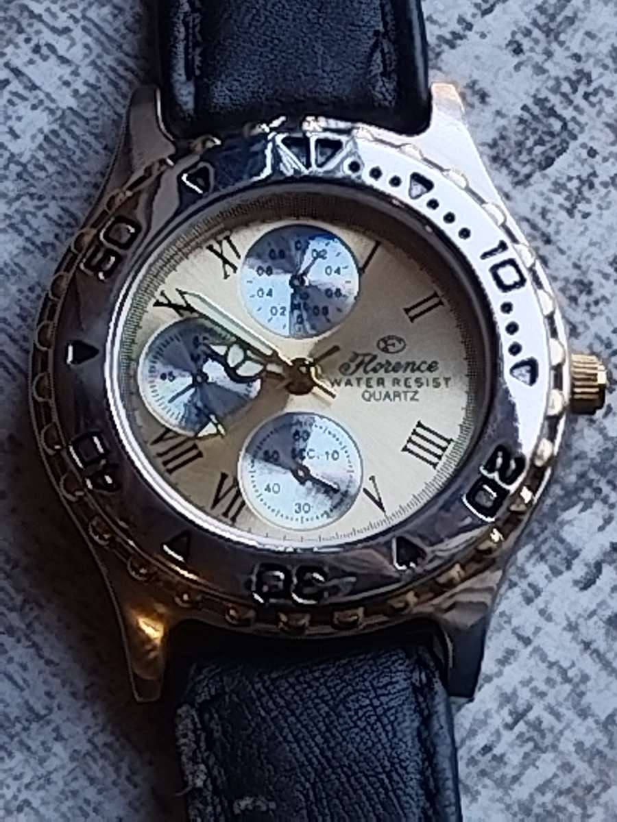 ELEGANT LADIES FLORENCE WATCH WITH ROTATING BEZEL IN EXCELLENT WORKING CONDITION